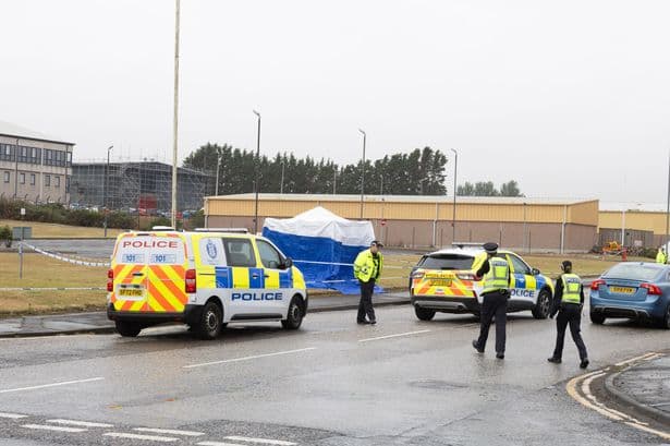 Forensics pictured at industrial estate in Arbroath after death of child