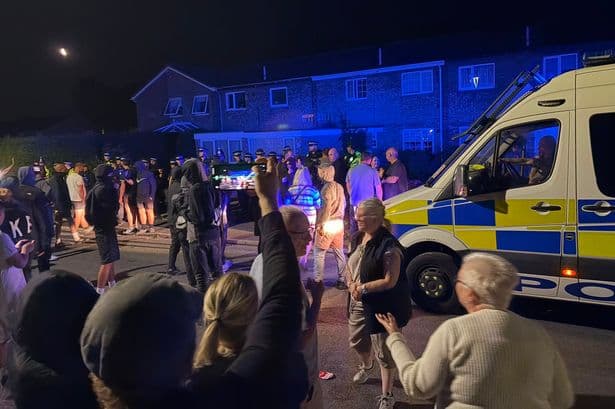 Female cop 'seriously bitten' as protesters 'try to storm asylum seekers homes' in Norfolk