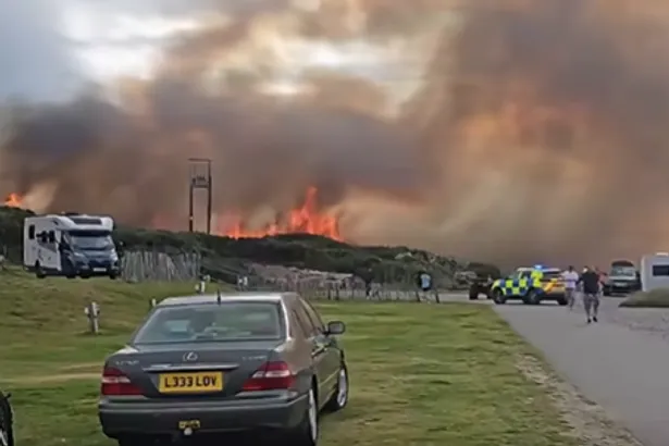 Huge blaze rages near Scots caravan park as fire crews continue to battle flames