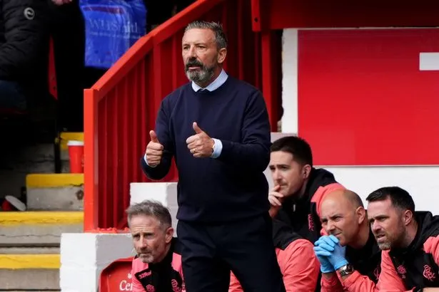 Rangers come through a battle to ease pressure on Derek McInnes