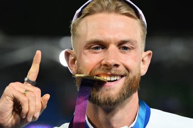 World Record holder Josh Kerr wins gold for Scotland in the men's mile race