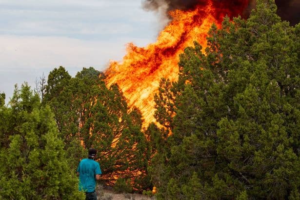 Helicopter battling fierce Utah wildfires crashes with two on board