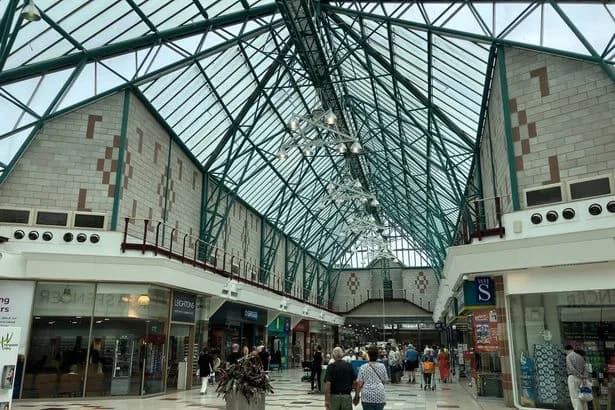 Man in his 30s dies at shopping centre as emergency services rush