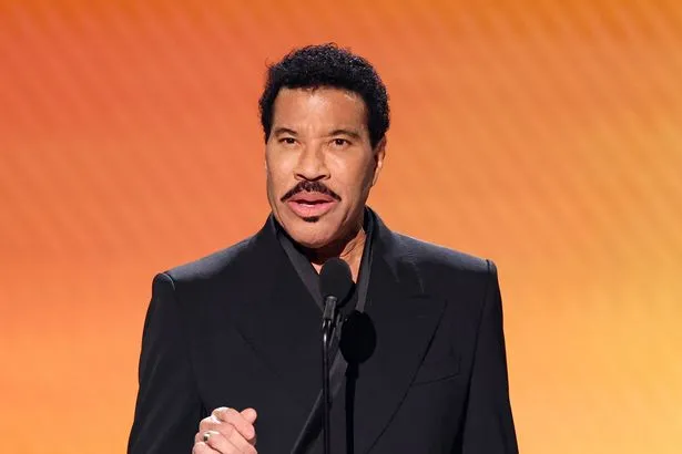 Lionel Richie rushed to hospital and 'treated in intensive care' after falling ill on stage