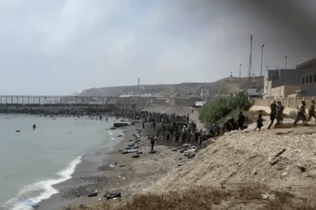Ceuta chaos as thousands cross into Spanish territory amid 'national emergency' plea