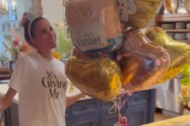 Prince Harry's exasperated groan caught on tape as birthday girl Meghan Markle goes wild