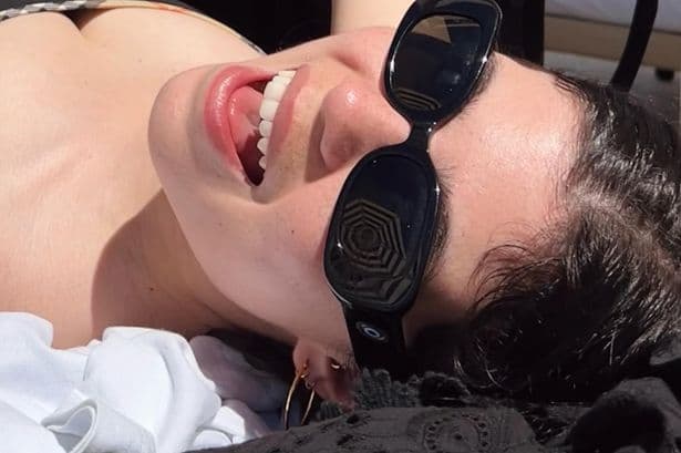 Liam Gallagher's daughter wows in bikini as she goes to beach with baby son
