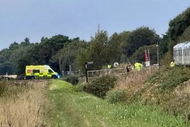 Man dies as train smashes into van on level crossing in major incident