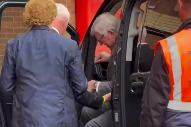 Sir Alex Ferguson arrives wearing protective boot ahead of Man Utd Premier League match