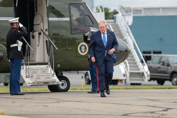 Donald Trump health fears grow as 'limping' president is seen 'staggering' off Marine One
