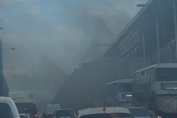 Tesco store 'evacuated' after major fire sparks 'total panic'