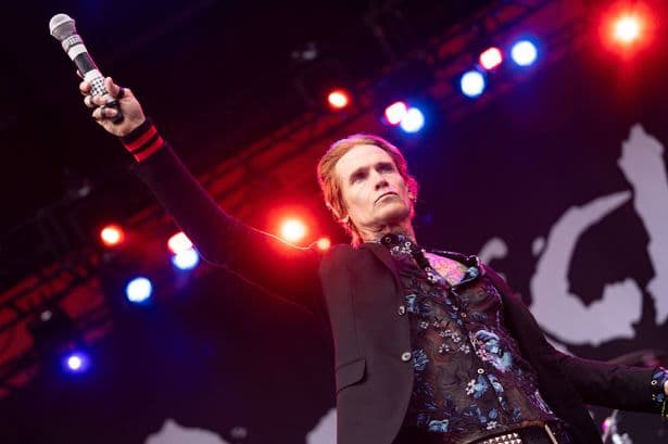 Major rock band's tour bus involved in multi-vehicle horror crash as one person dead