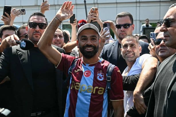 Mo Salah wears new shirt and mobbed by fans as Liverpool icon jets in to seal transfer