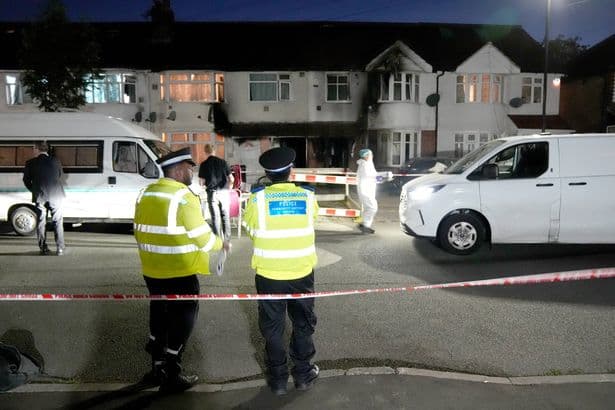 Murder probe after woman dies and eight others rushed to hospital in horror blaze at home
