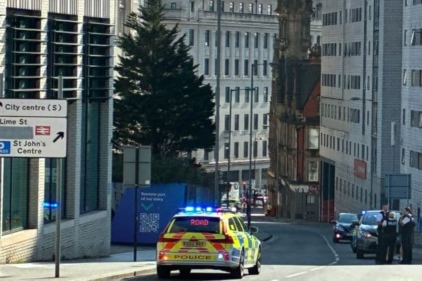 Liverpool city centre road closed as man taken to hospital