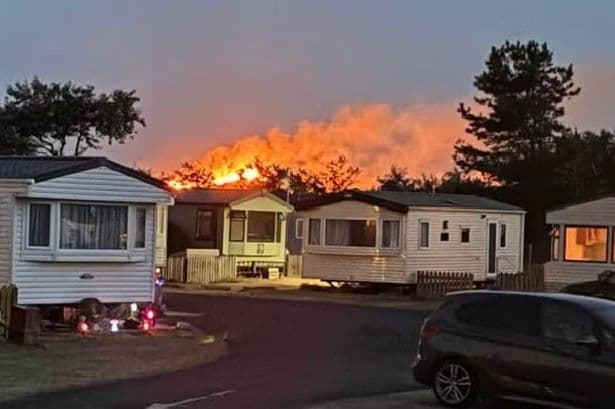 Fire crews tackling 'significant' blaze burning 'for hours' in Formby sand dunes