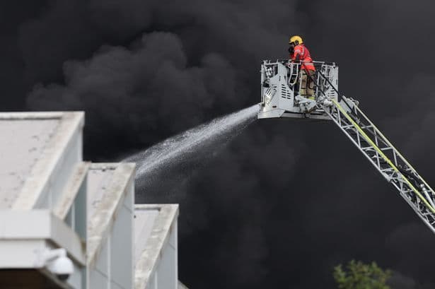Homes evacuated as firefighters tackle huge fire near supermarket in Saddleworth - ITVX