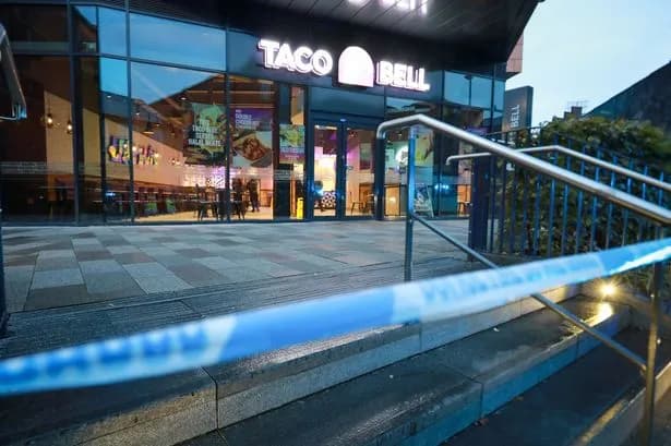 Police flood Rochdale town centre to 'restore peace' after boy, 13, stabbed in Taco Bell toilets