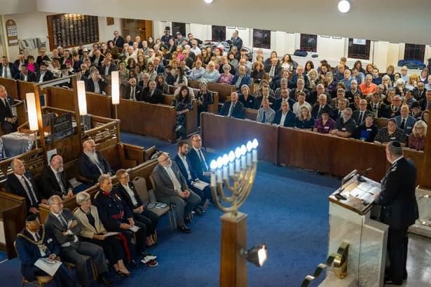 Open prayer books and moving tributes as Heaton Park Synagogue remembers the victims of the Yom Kippur terror attack