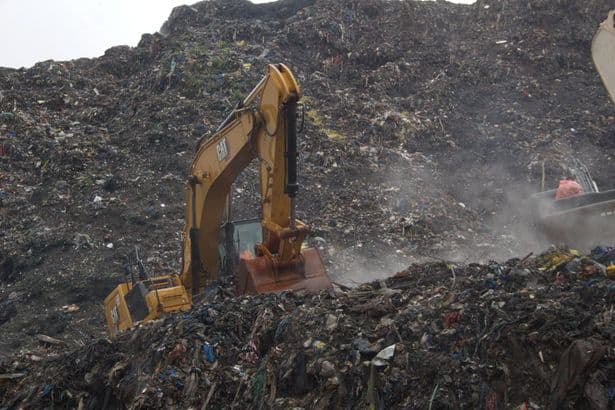 At least 30 killed and six injured after landslide at huge landfill