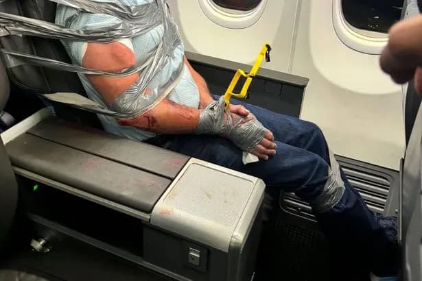 American Airlines passenger duct-taped to seat after violent outburst
