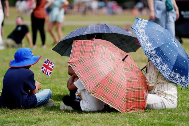 Met Office considers issuing red 'extreme heat warning' across Britain while nation enjoys 'incredible summer'