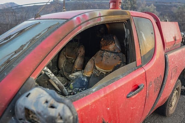 Tourists among thousands of people evacuated on Crete as wildfires kills two firefighters