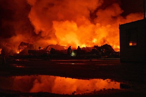 Fires rage after Russian missile and drone attack on Kyiv