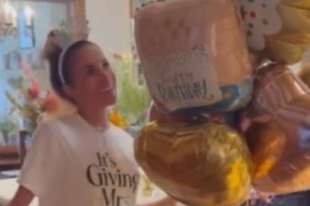 Meghan Markle shares video of her dancing around her kitchen while Harry films on her birthday