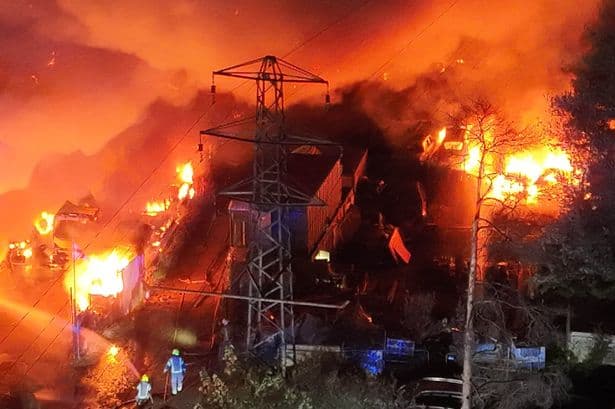 Cars destroyed in huge fire at parking site used by Gatwick Airport holidaymakers as thousands left without power