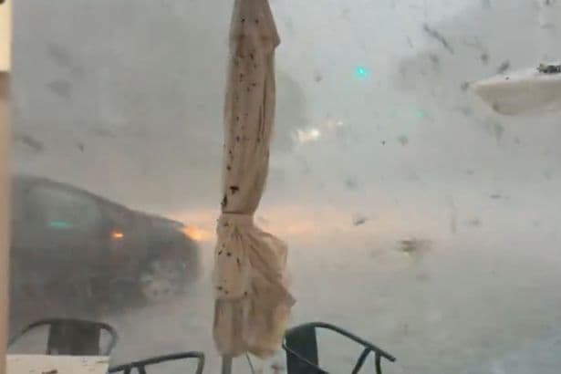 Brits in Spain issued 'stay indoors' warning as thunderstorms strike holiday hotspots
