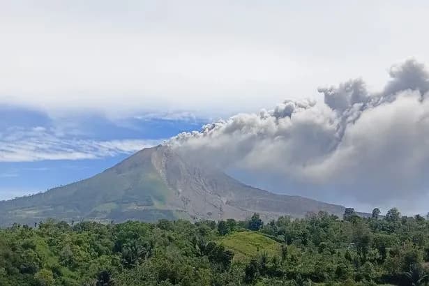 Indonesia’s Mount Sinabung volcano in major eruption as ash spews two miles into air