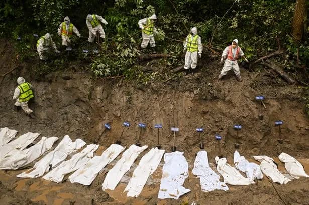 Mass burials of unidentified victims continue in Nepal as death toll exceeds 1,000 one week after flash floods