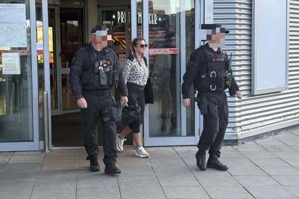 'Black Widow' fraudster Pamela Gwinnett at Manchester Airport after Tenerife extradition