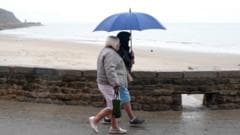 Thunderstorm warnings expire but rain continues to bring risk of floods for UK