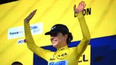 Reusser takes Tour lead with time trial win