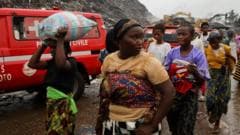 Photos: Towering landfill collapse kills 30 in Guinea’s capital, Conakry