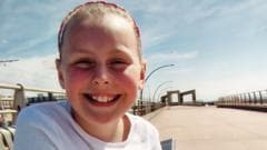 Family 'devastated' by death of girl, 9, as man charged with murder