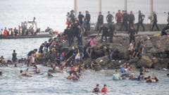 EU calls for strengthening borders after thousands of migrants pour into Spain from Morocco
