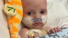 Baby whose parents feared had just days to live is 'thriving' after life-saving heart operation