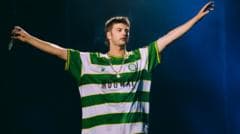 Semi-pro football club 'in shock' after shirt worn by Reading Festival headliners