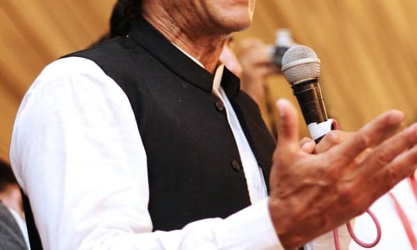 Former PM Imran Khan would not confront Pakistan army chief if freed, close aide says