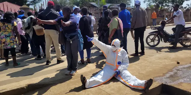 In DR Congo, healthcare workers on the front lines of Ebola face anger and exhaustion as they remain unpaid