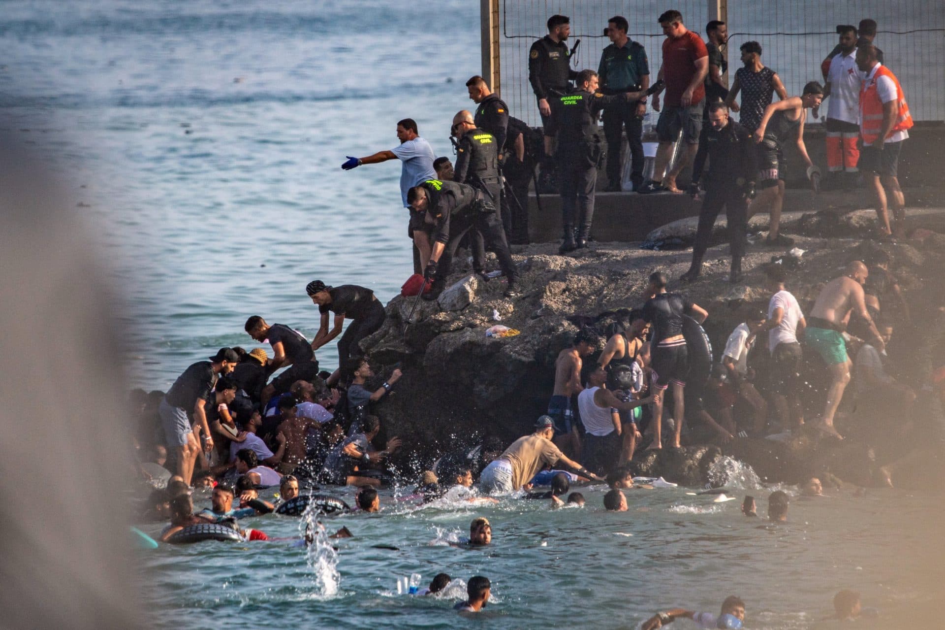 Over 60 dead after thousands cross Spain-Morocco border