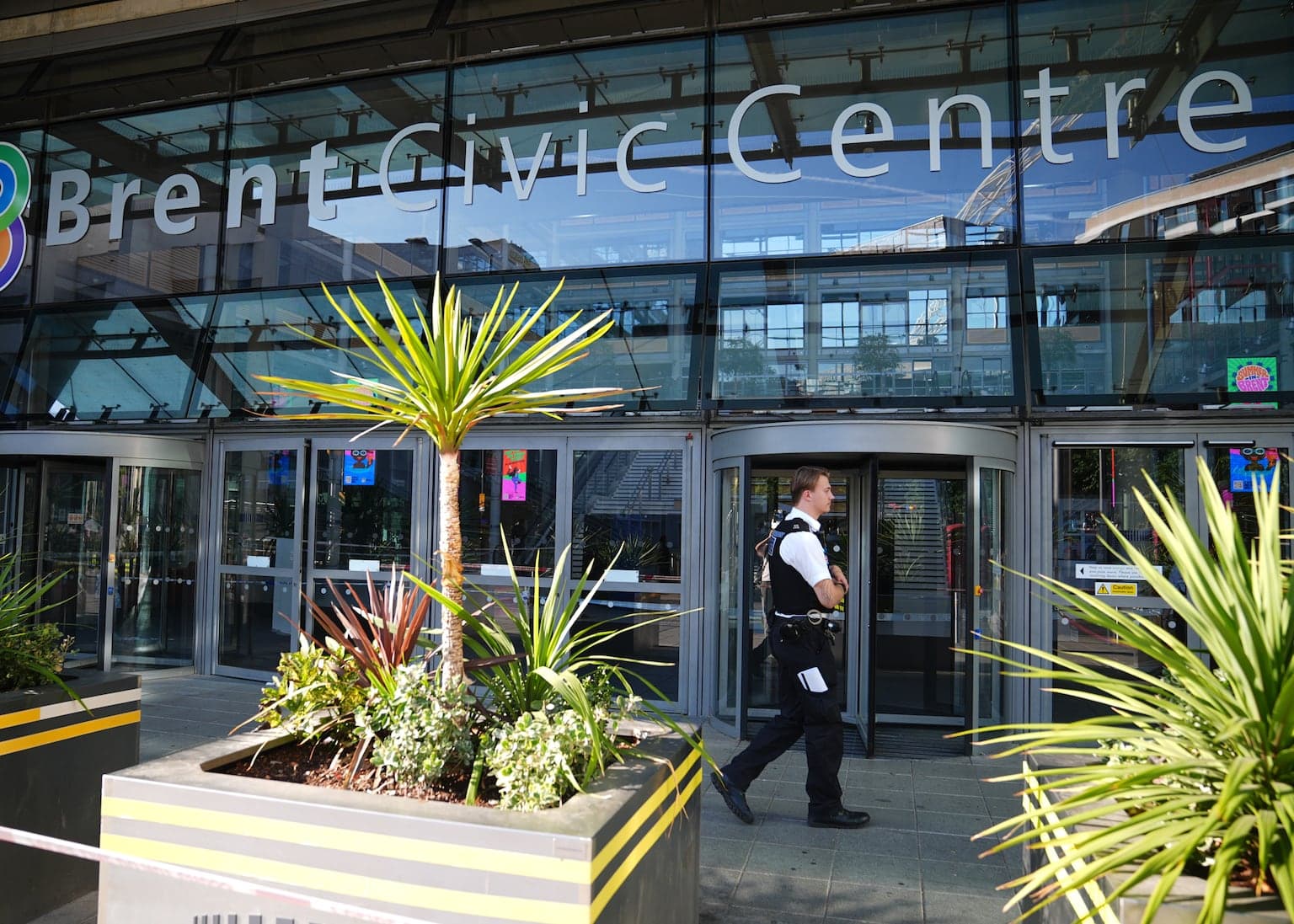 Murder investigation launched as young man dies after stabbing at council HQ