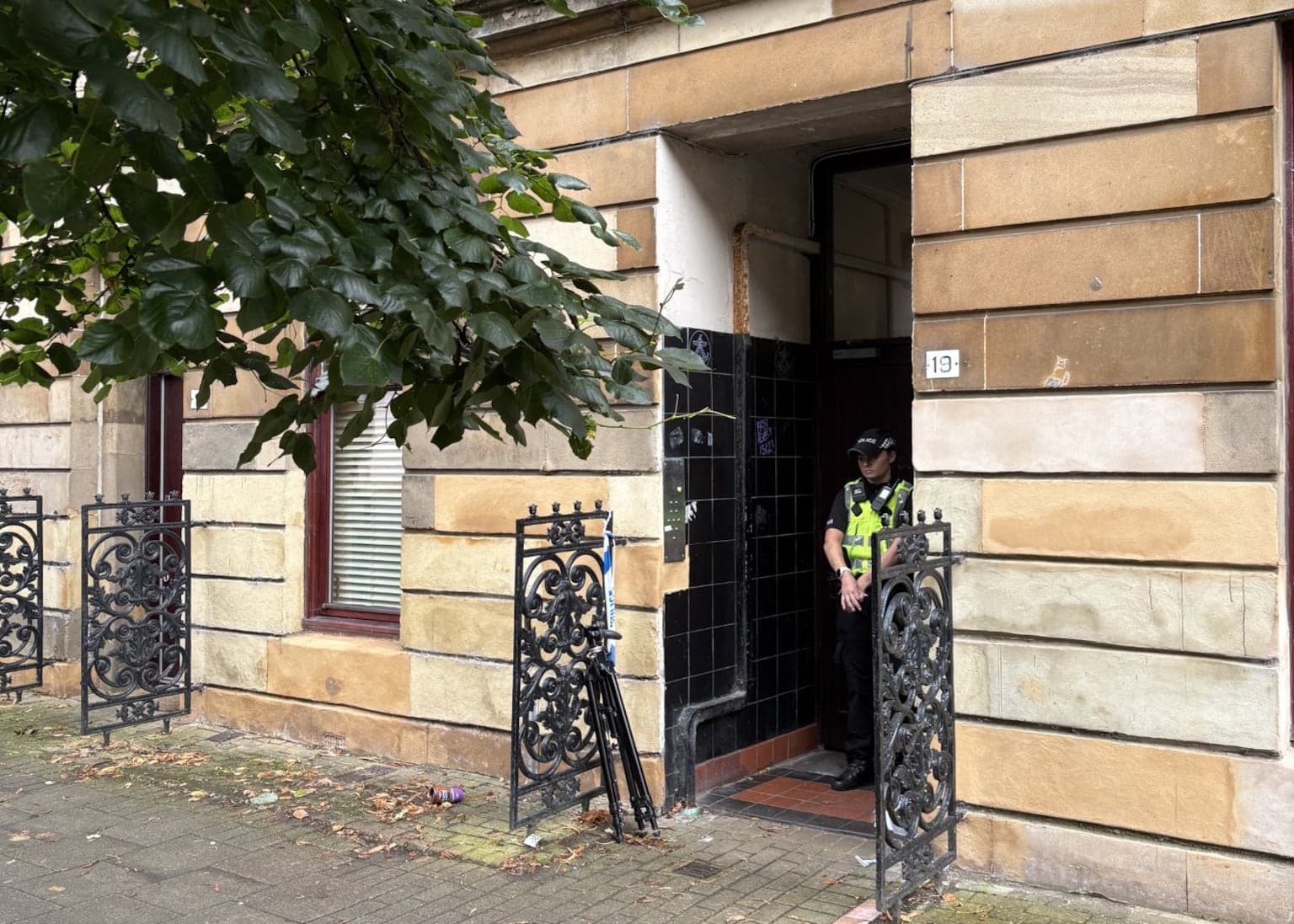 Double murder hunt launched after two men found dead in flat