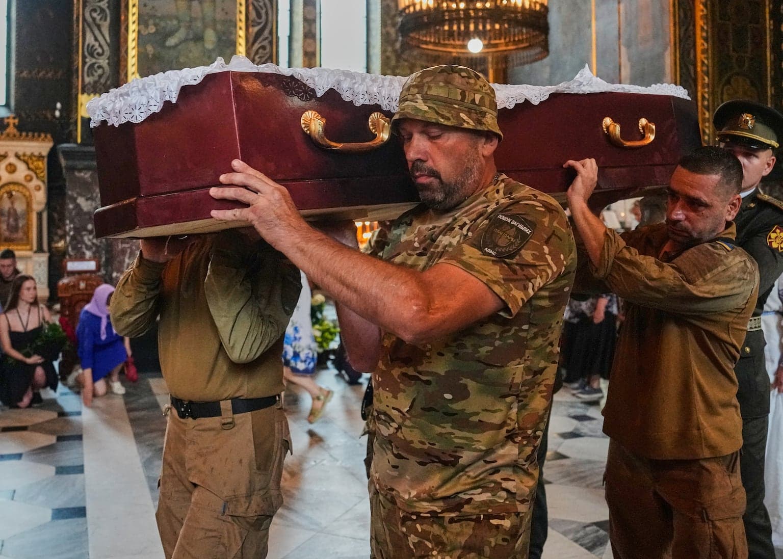 Ukraine’s ‘collector of souls’ honoured after being killed recovering war dead