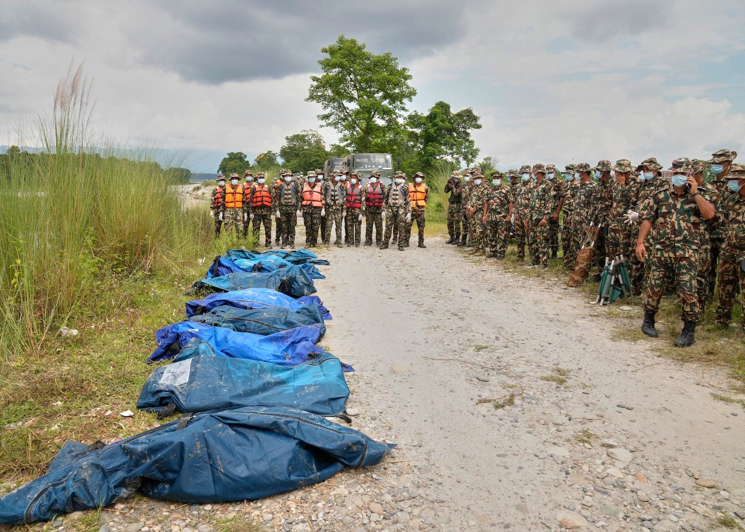 Hundreds feared stuck in hydropower tunnels as Nepal/China flood deaths pass 950