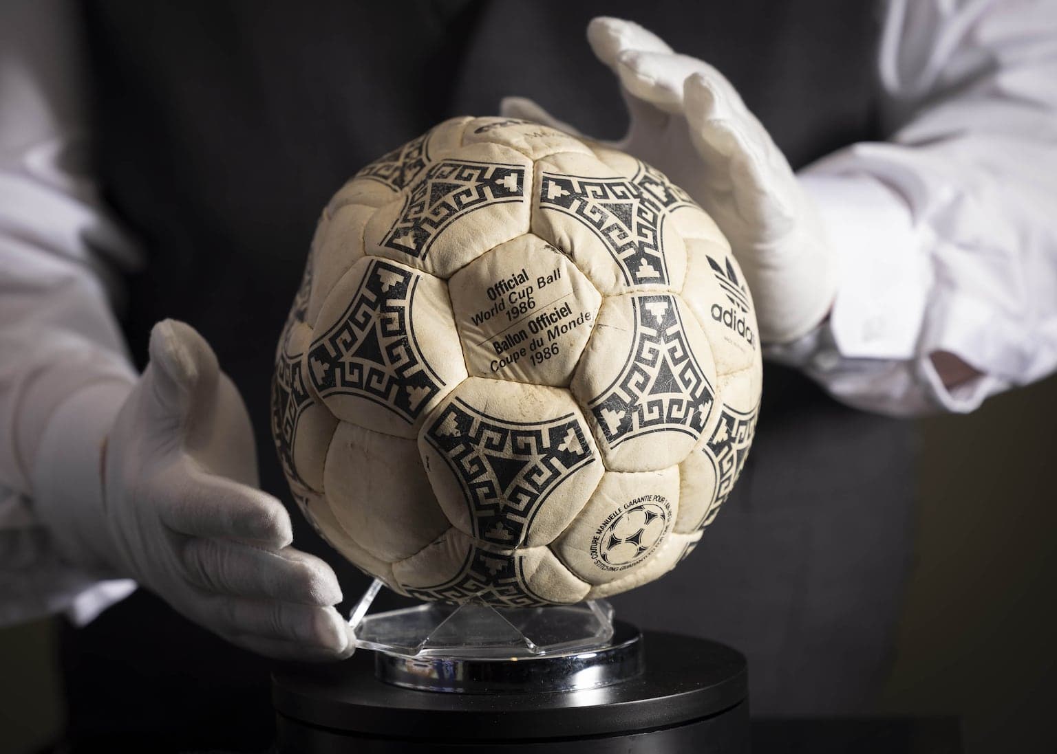 Maradona’s ‘Hand of God’ football sold at auction