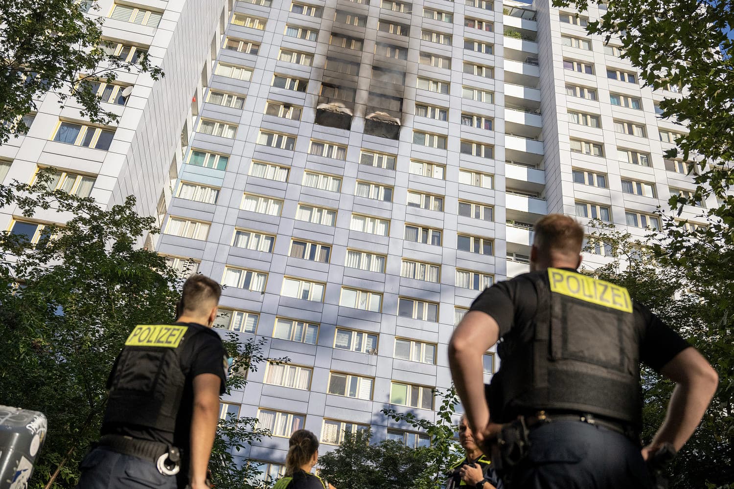 Woman leaps from 11th-floor ledge into firefighter’s arms as Berlin high-rise burns